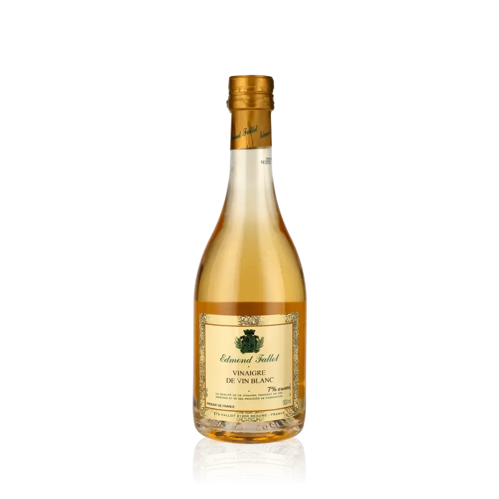 Flasche Edmond Fallot Weißweinessig vor schwarzem Hintergrund.