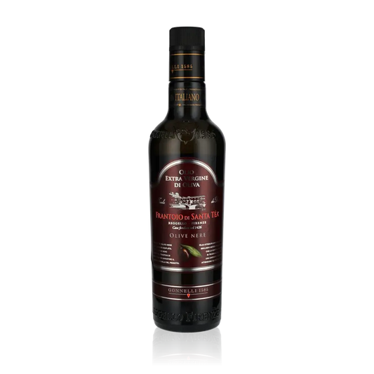 Flasche Frantoio di Santa Tea Olivenöl auf schwarzem Hintergrund.