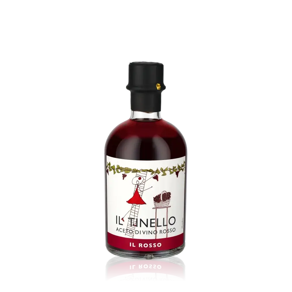 Il Tinello Il Rosso Weinessig Flasche vor schwarzem Hintergrund.