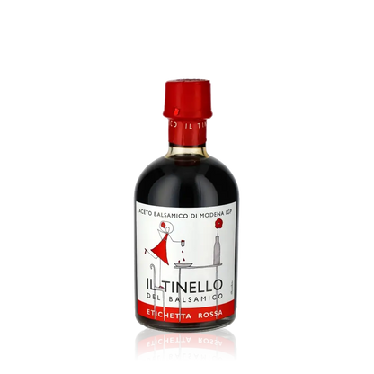 Il Tinello Balsamico Essigflasche mit rotem Etikett.