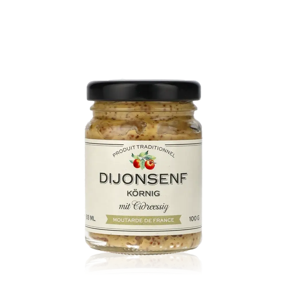 Dijonsenf körnig mit Cidreessig im Glas.