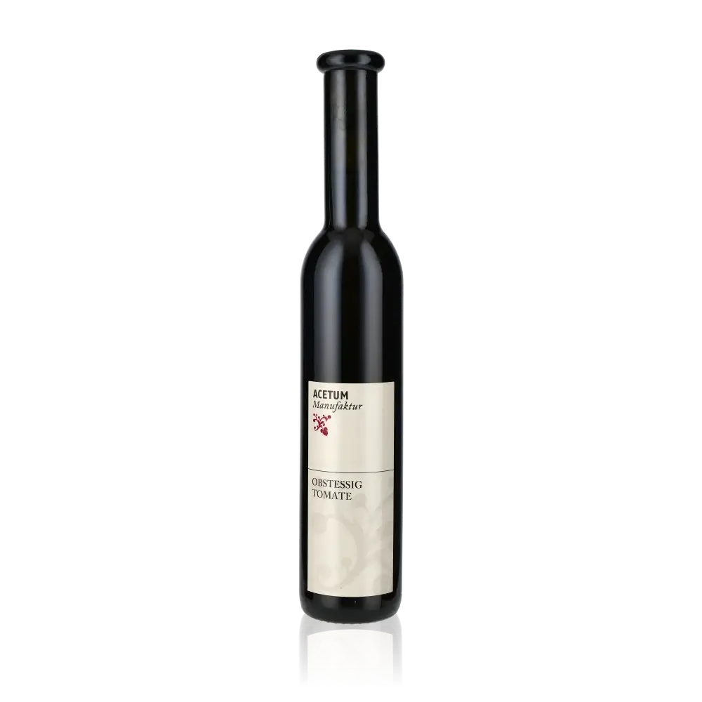 Flasche Martin Albrecht Tomatenessig 250ml vor schwarzem Hintergrund.