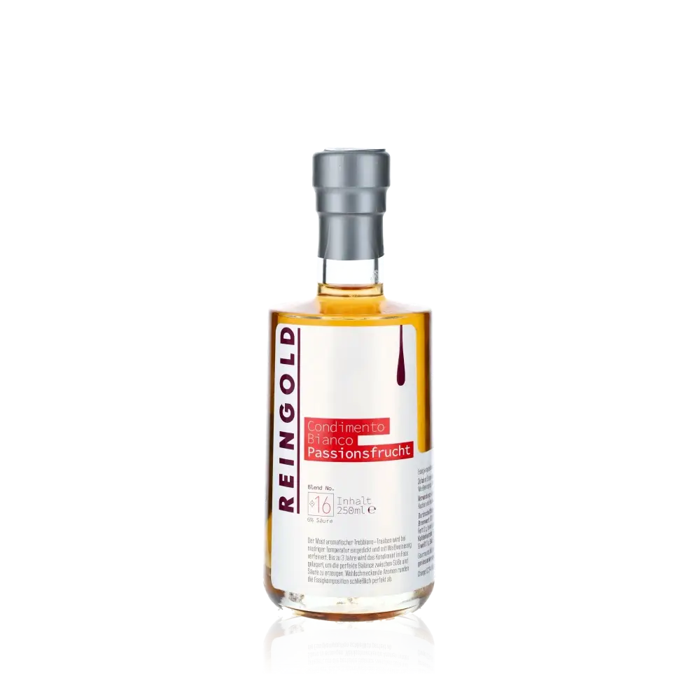 Reingold Condimento Bianco Passionsfrucht Flasche vor schwarzem Hintergrund.