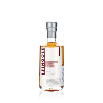 Reingold Condimento Bianco Trüffel Essigflasche auf schwarzem Hintergrund.