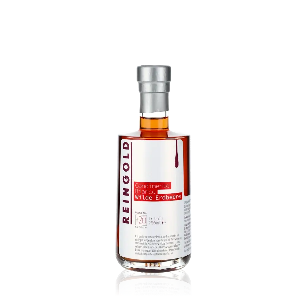 Reingold Condimento Bianco Wilde Erdbeere Flasche vor schwarzem Hintergrund.