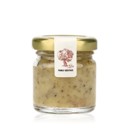 Trüffelbutter im Glasbehälter.
