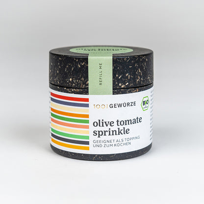 1001 Gewürze Olive Tomato Sprinkle Gewürzbehälter auf weißem Hintergrund.